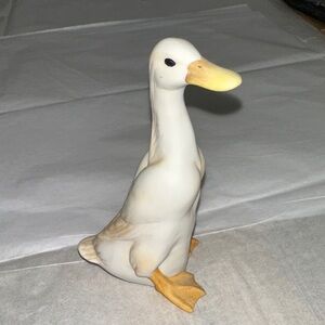 White and Yellow Ceramic Duck Figurine